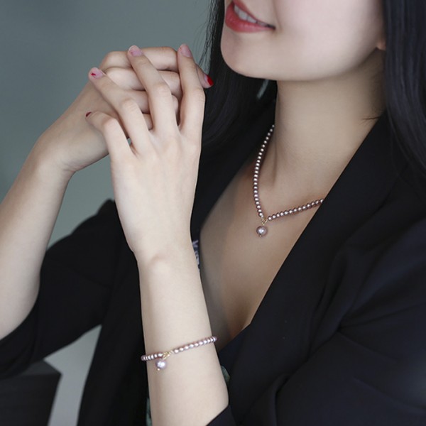 Lắc tay vàng 18k ngọc trai thật 4-4.5mm Nin