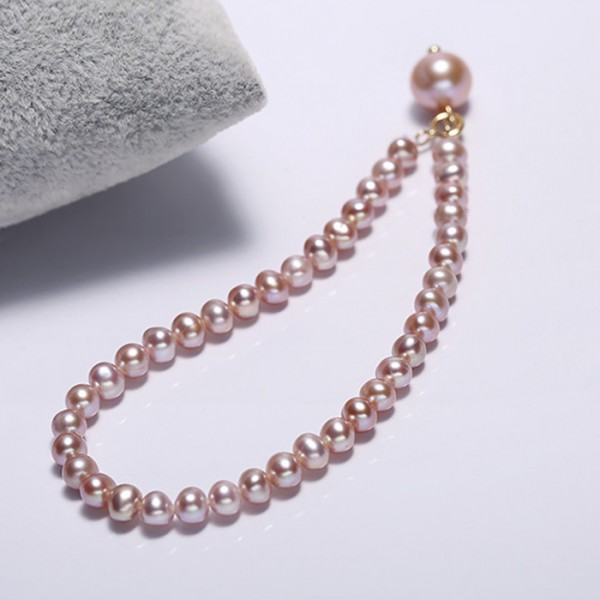 Lắc tay vàng 18k ngọc trai thật 4-4.5mm Nin