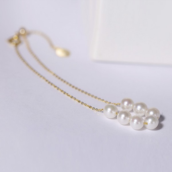 Lắc tay vàng 18k ngọc trai thật 4.5-5mm Mario