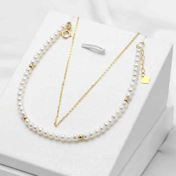 Lắc tay vàng 18k ngọc trai thật Tore 3-4mm 