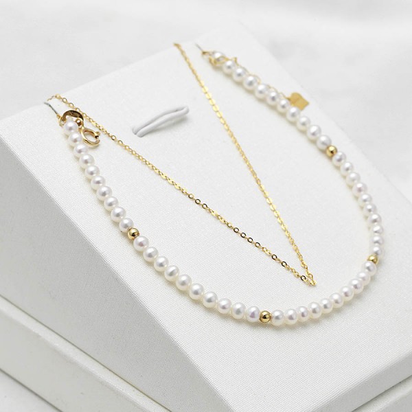 Lắc tay vàng 18k ngọc trai thật Tore 3-4mm 