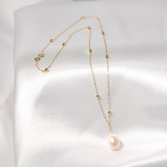 Dây chuyền ngọc trai nước ngọt gắn vàng 18k 8 bi 1 trai giọt lệ trắng