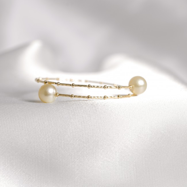 Lắc tay ngọc trai nước mặn South Sea gắn vàng 18k đính kim cương