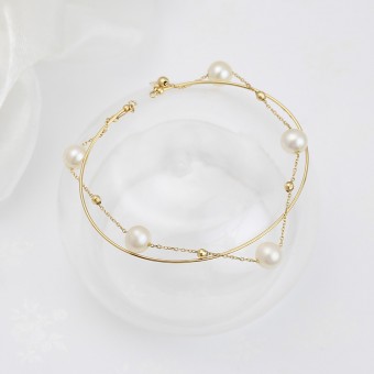 Lắc tay vàng 18k ngọc trai thật 6-7mm Reo