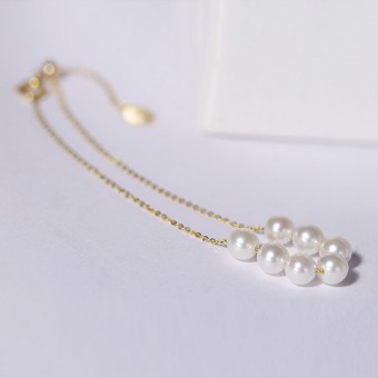 Lắc tay vàng 18k ngọc trai thật 4.5-5mm Mario
