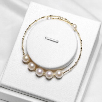 Lắc tay vàng 18k ngọc trai thật 7.5-8mm Deki