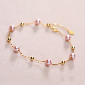 Lắc tay vàng 18k ngọc trai thật Heri