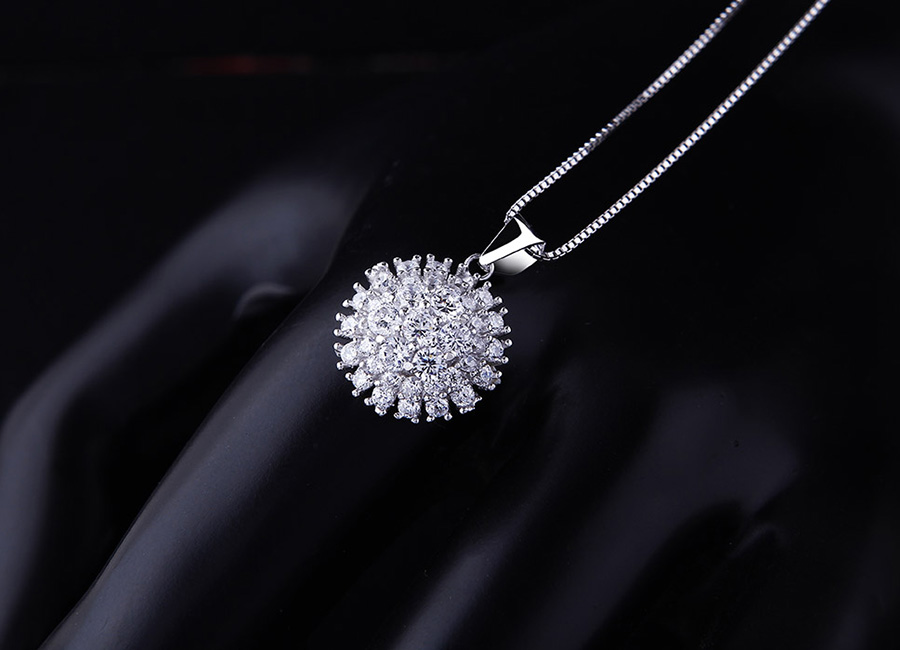 Mẫu trang sức được tạo h&igrave;nh từ &yacute; tưởng b&ocirc;ng hoa hướng dương.